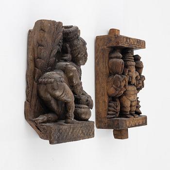 Two Indian carved wooden reliefs, around 1900.