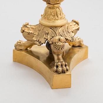 A latter half of the 19th-century candelabrum/ table light, altered in the 20th century.