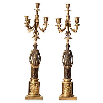 77. A pair of Empire 19th century five-light candelabra.