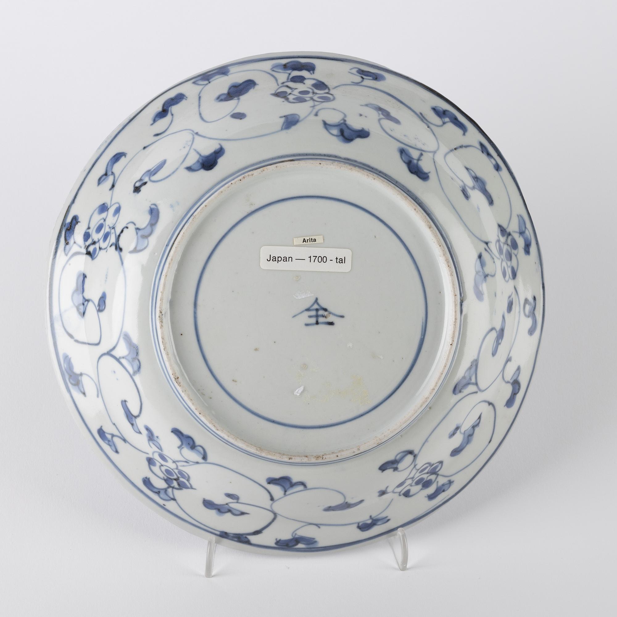 A Japanese blue and white dish, 18th Century.