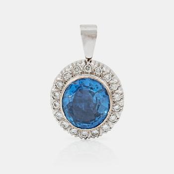 919. An untreated sapphire, circa 24.00 cts and brilliant cut diamonds, total carat weight circa 1.50 cts, pendant.