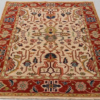 A RUG, Ushak design, ca 184 x 123 cm.