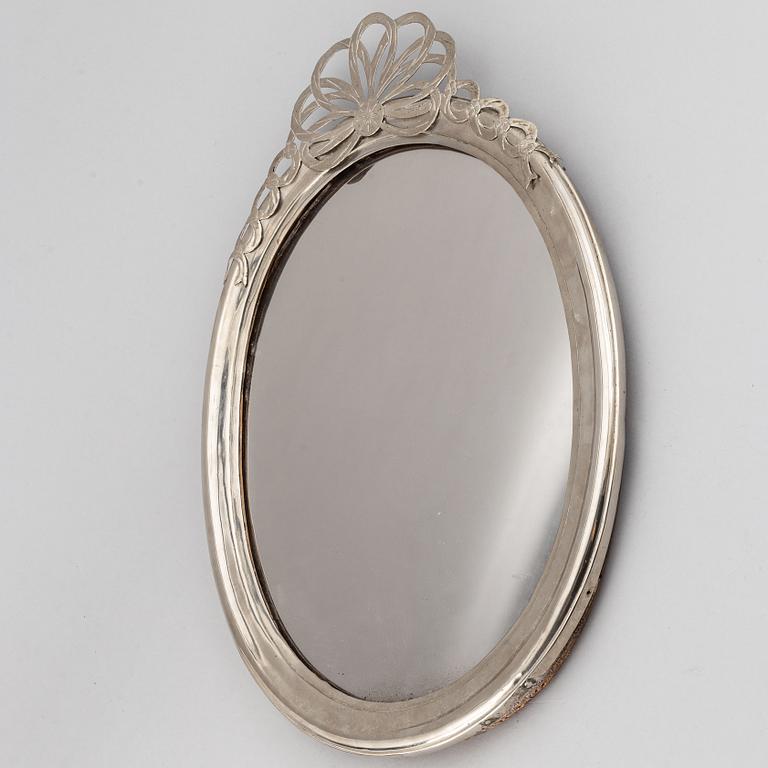 A Russian possibly 18th century silver mirror.