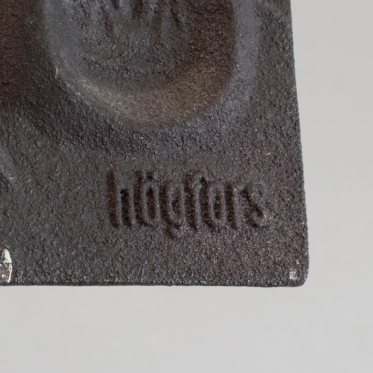 MICHAEL SCHILKIN, a cast iron plaque "See no evil, hear no evil, say no evil", signed and dated Högfors 1961.