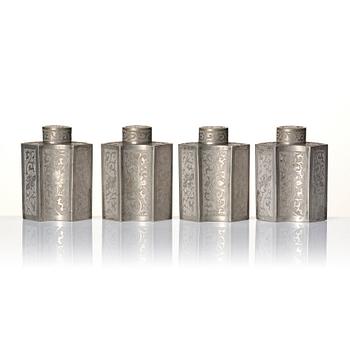 A Chinese lacquer box with a set of five pewter tea caddies, Qing dynasty, 18/19th Century.