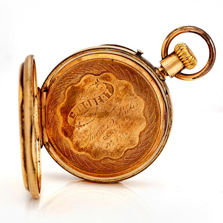 A mid 1800s gilded bronze pocket watch stand and pocket watch.