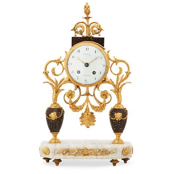 554. A late Gustavian circa 1800 mantel clock.