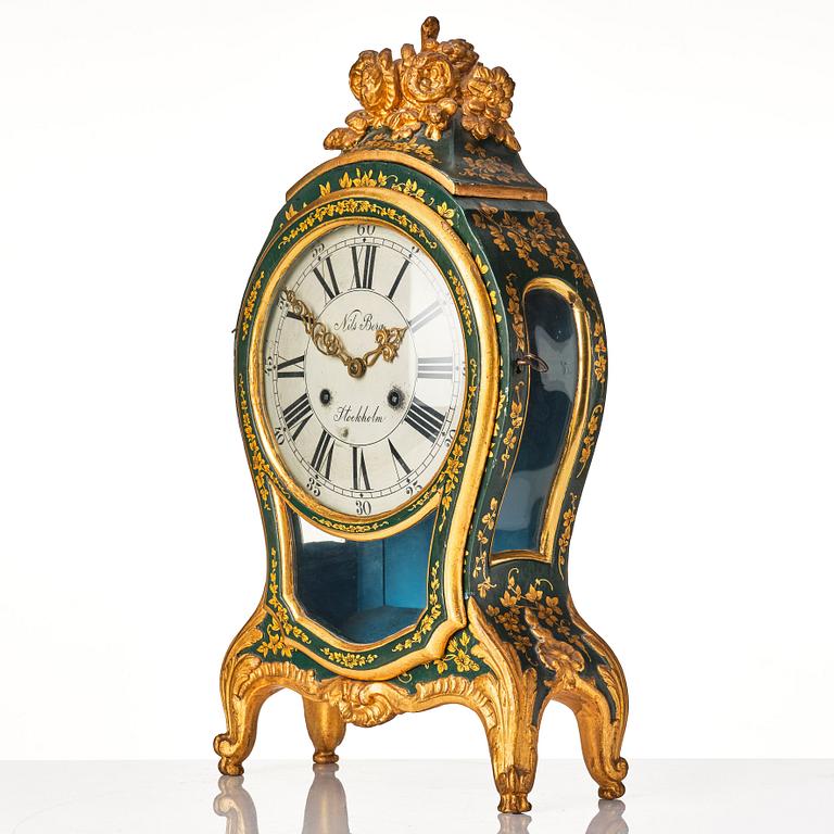 A Swedish rococo mantel clock by N Berg.