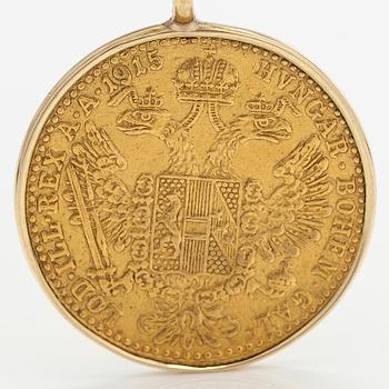 A gold coin pendant, Frans Josef I, Austria-Hungary, 1915. with a 14K gold chain.