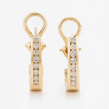 Earrings, a pair, 14K gold and brilliant-cut diamonds.