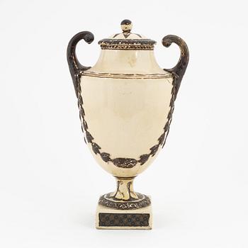 A creamware lidded urn, Late Gustavian, around 1800.