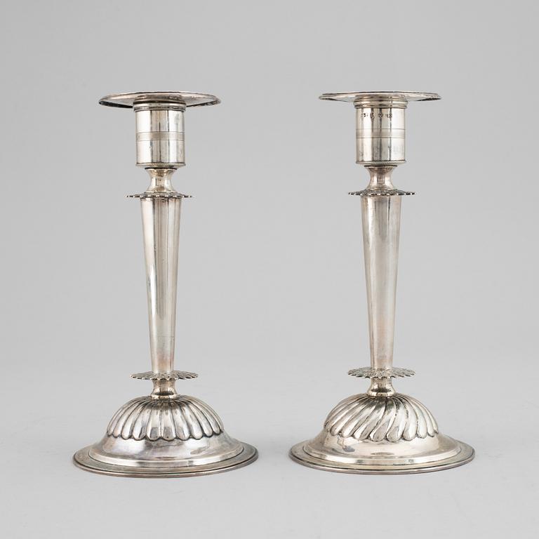 A pair of Empire silver candle sticks, 1823.