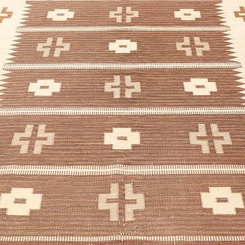 A carpet, flat weave, ca 291 x 202 cm, signed SH.