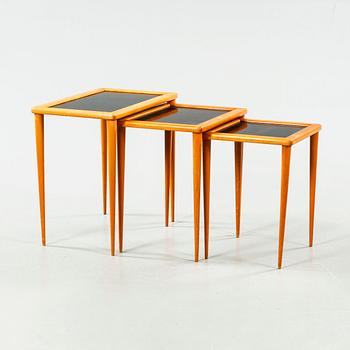 An nest of table of three pieces from the second half of the 20th century.