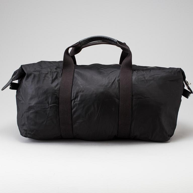 A foldable Mulberry weekend bag.