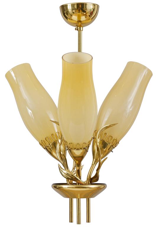 Paavo Tynell, PAAVO TYNELL (FINLAND), A PENDANT CEILING LAMP, brass, three yellow glass shades. Idman.