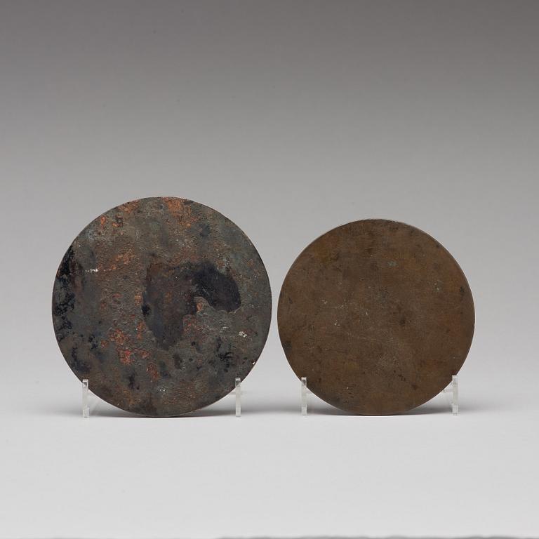 Two bronze mirrors, Tang dynasty (618-907).