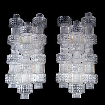 A pair of wall lamps by Gert Nyström for Fagerhult, second half of the 20th century.