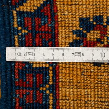 An oriental runner, ca 305 x 94 cm.