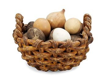 1201. An Ingrid Herrlin stoneware basket with potatos, onion and eggs, Båstad.