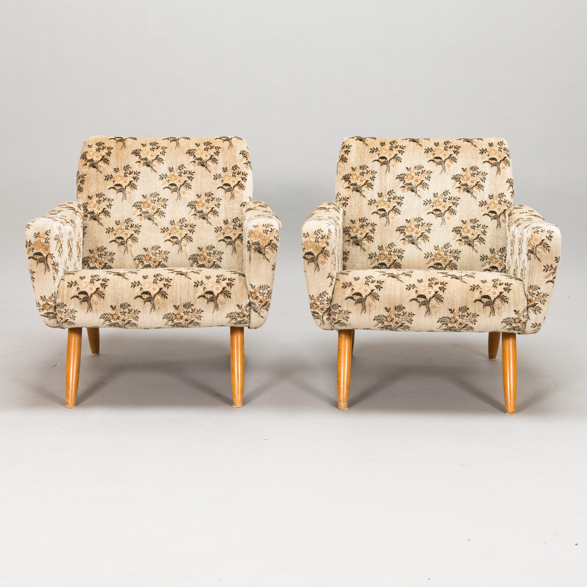 A pair of 1950s / 60s armchairs.