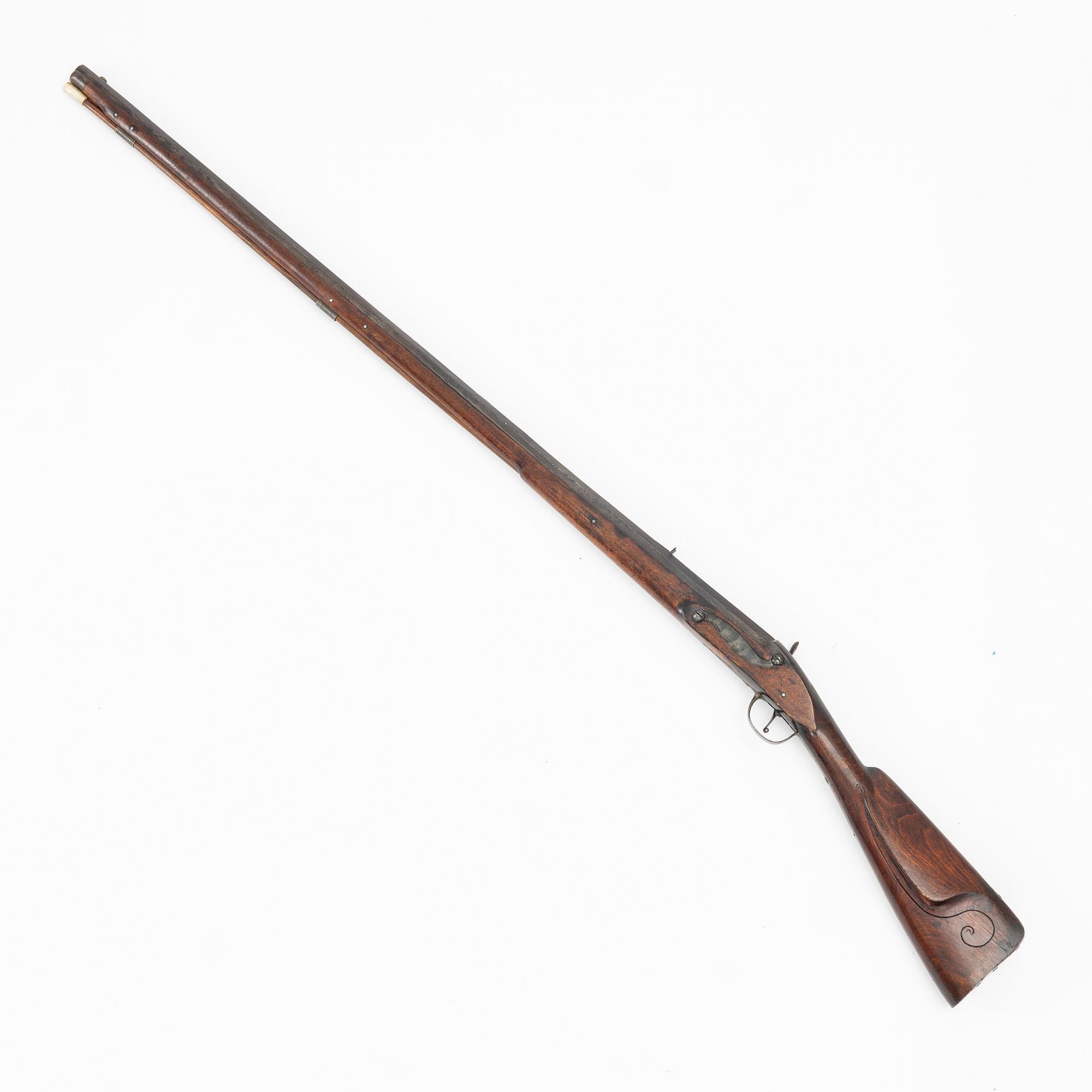 Percussion gun.