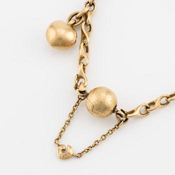 Ole Lynggaard, bracelet, 18K gold with charm and ball clasp.