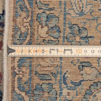 A semi-antique Kerman carpet, c. 273 x 172 cm.