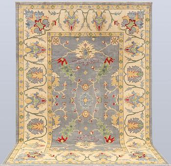 A carpet, Ziegler design, approx. 302 x 206 cm.