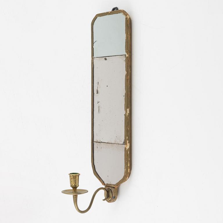 A Gustavian one-light girandole mirror, later part of the 18th century (later copy follows the lot).