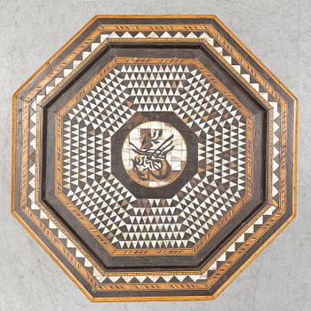 A mother of pearl and wood small table, 20th century.