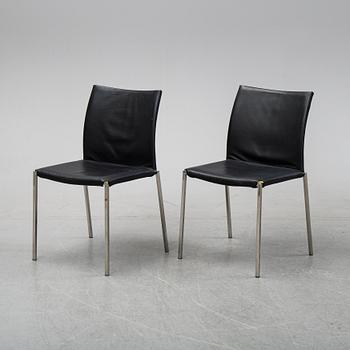 A set of eight steel and leather chairs, 21th century.