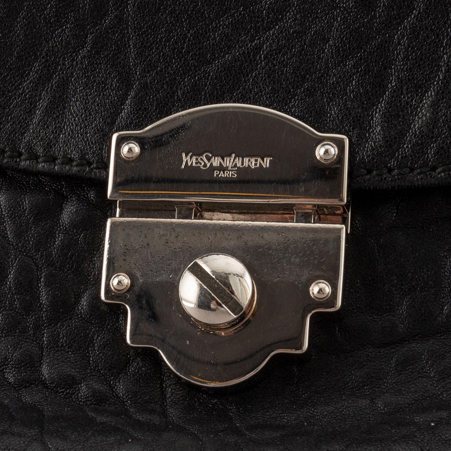 Yves Saint Laurent, a black leather bag.