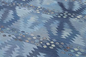 Barbro Nilsson, a carpet, 'Tånga mellanblå', flat weave, c. 350 x 252 cm, signed AB MMF BN.