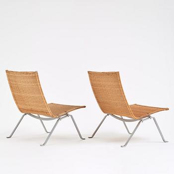 Poul Kjaerholm, a pair of steel and rattan 'PK22' easy chairs, edition E Kold Christensen, Denmark.