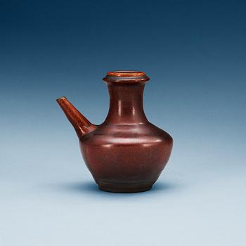 1234. A chesnut brown glazed kendi, Yuan dynasty (1280-1368).