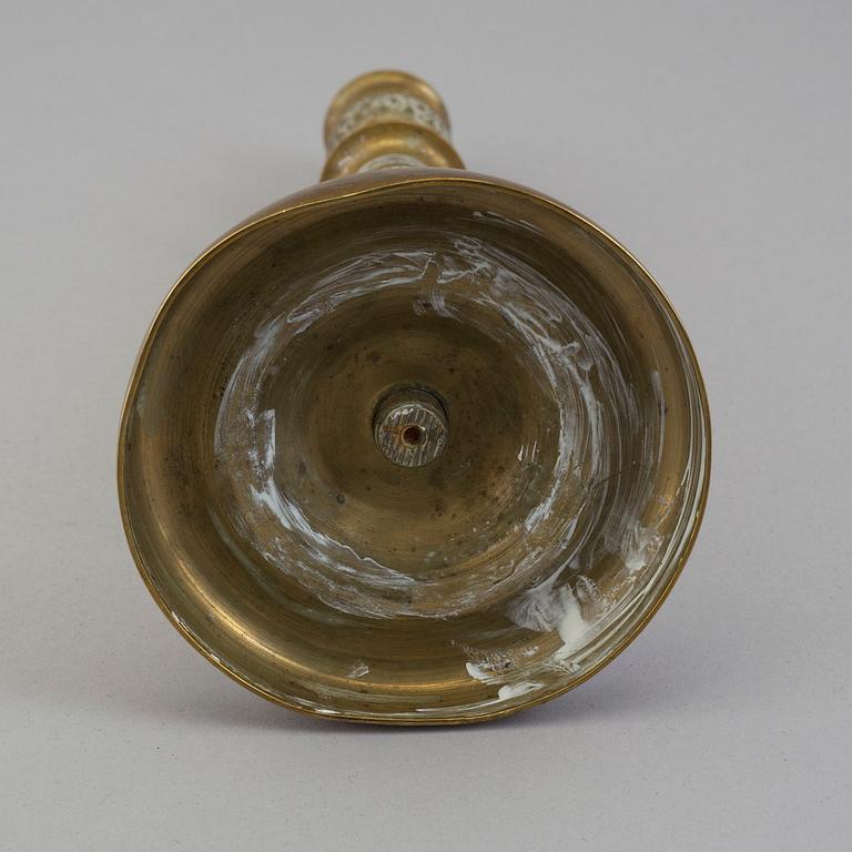 A first half of the 19th century Empire bronze candlestick.