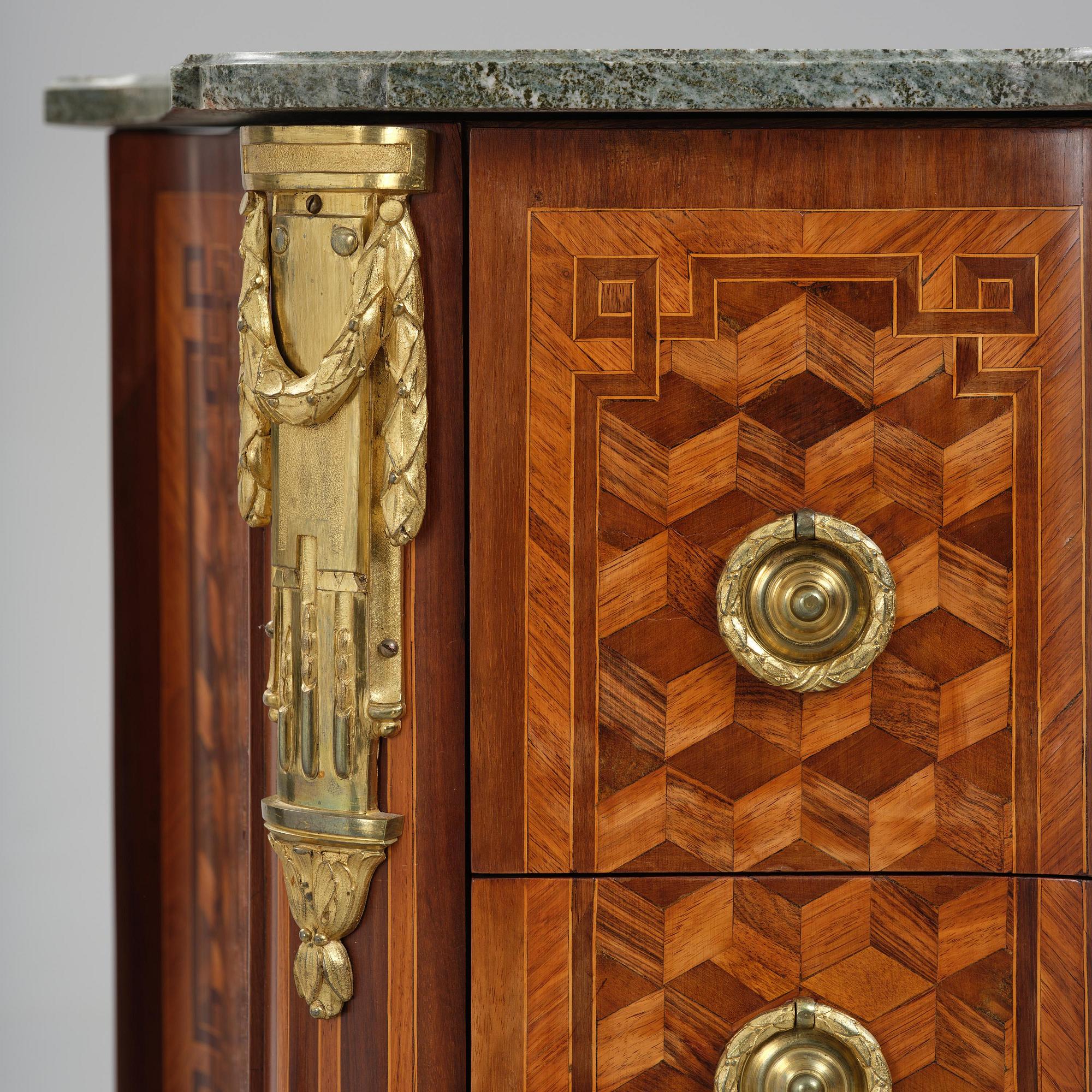 A Louis XVI rosewood and amaranth marquetry ormolu-mounted commode by Leonard Boudin (master in Paris 1761).