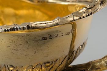 A SAUCE-BOAT WITH LADLE, 84 silver. Gilt. Nichols & Plincke, purveyer of the court, St. Petersburg 1859. Weight 1600 g.
