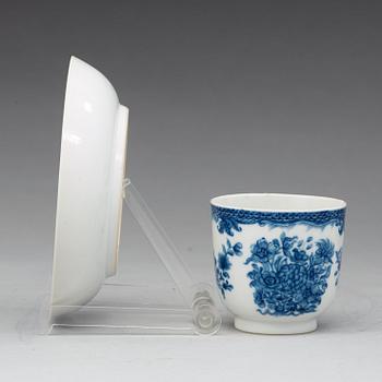 A set of eight blue and white cups with saucers and suger bowl with cover and stand, Qing dynasty, Qianlong (1736-95).