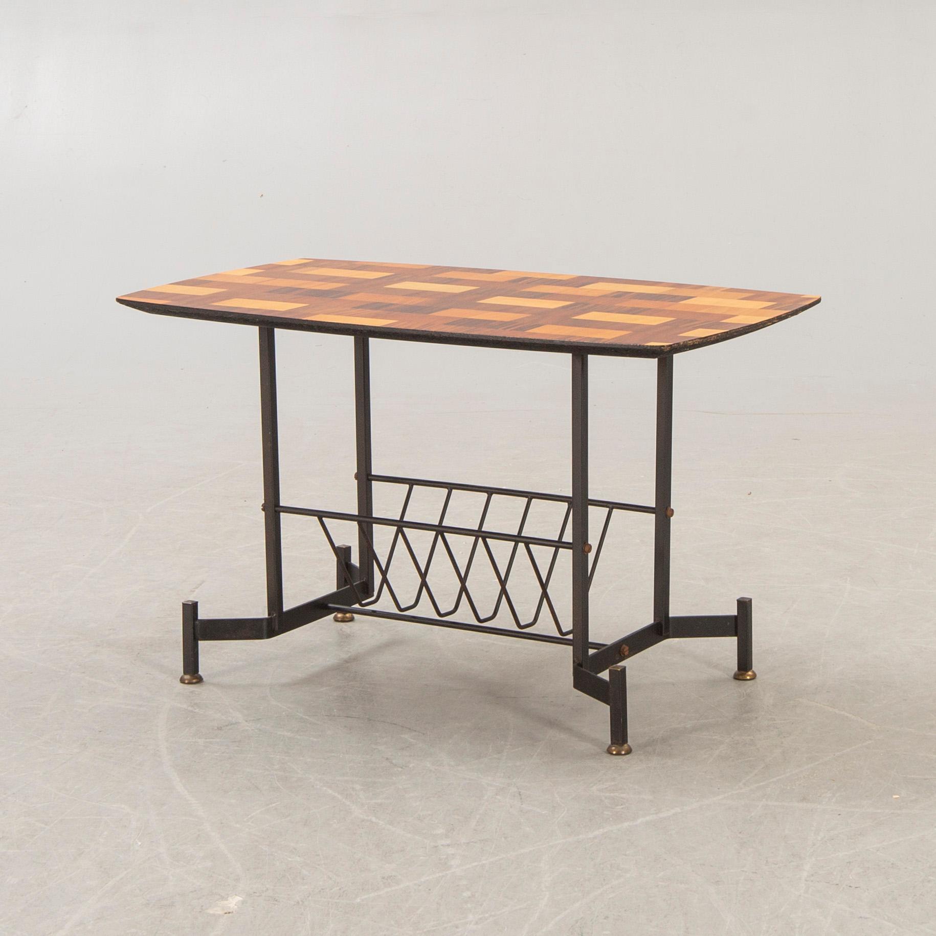 An Italian 1950s mahogany, walnut side table.