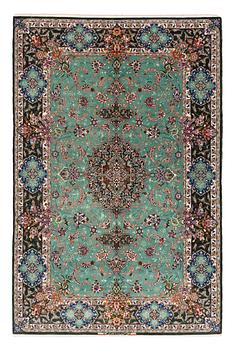 291. A rug, old Esfahan, part silk, signed, ca 225 x 149 cm (ca 1,5-2,5 cm flat weave at the ends).