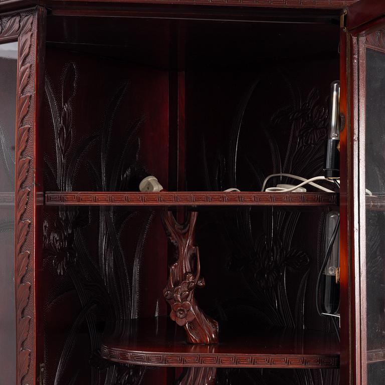 A display cabinet, China, 20th Century.