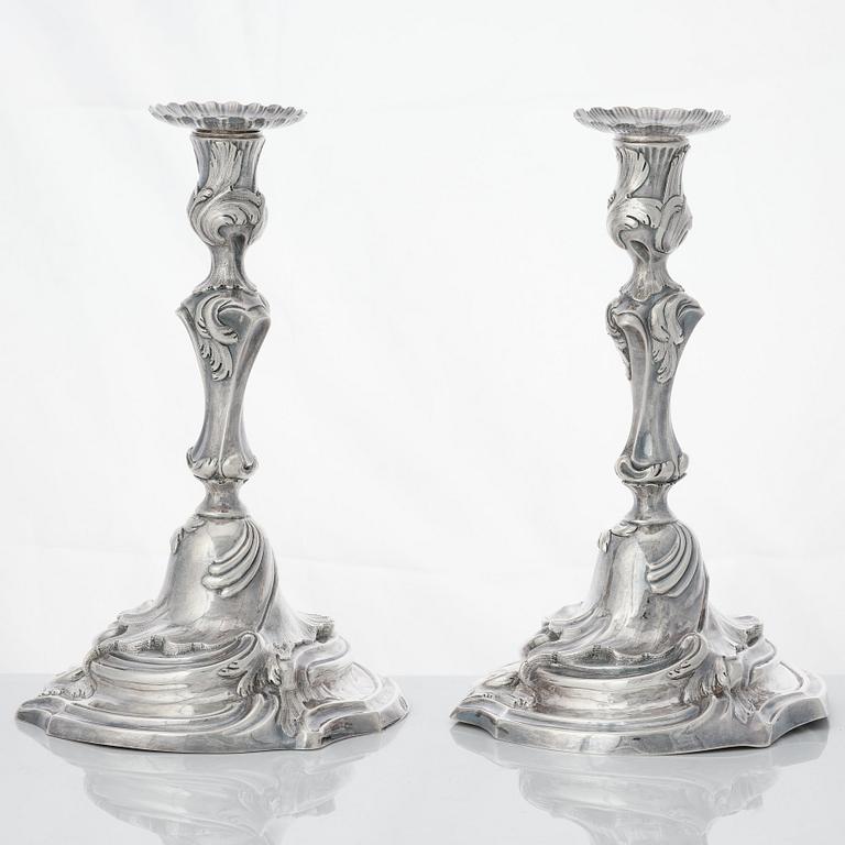 Four Swedish Rococo silver candlesticks, mark of Arvid Floberg, Stockholm 1768 and 1779.