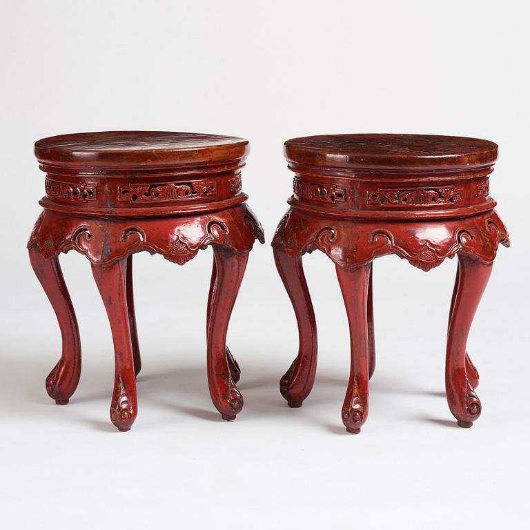 A pair of Chinese red lacquered stools/stands, early 20th century.