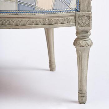 A pair of late Gustavian open armchairs by J. E. Höglander (master in Stockholm 1777-1813).