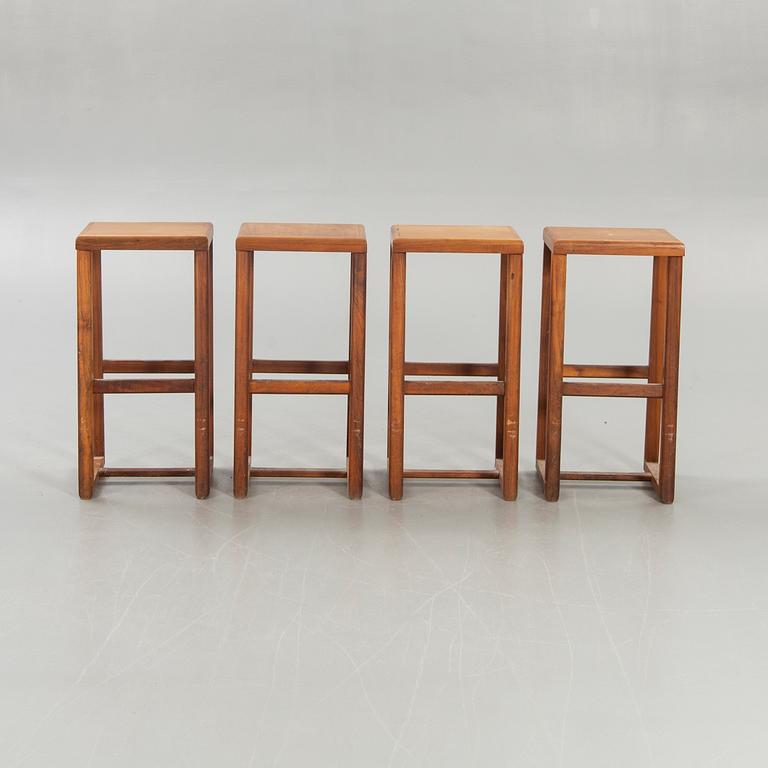 Four bar stools, 20th century.