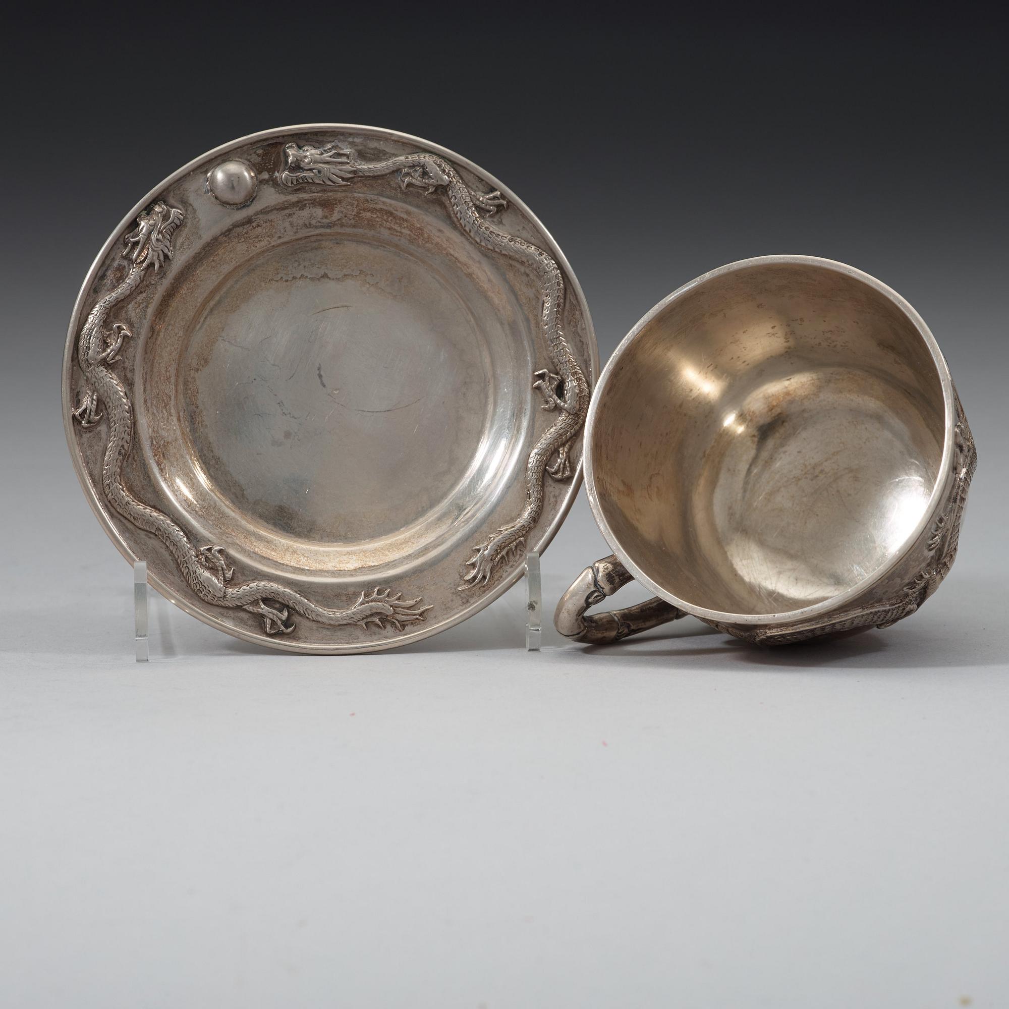 An export silver cup and saucer, probably Shanghai, early 20th century.