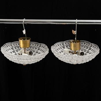 Carl Fagerlund, a pair of ceiling lamps, Orrefors, second half of the 20th Century.