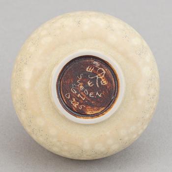 Gunnar Nylund, a set of six stoneware bowls, two miniature vases and a vase for Rörstrand.